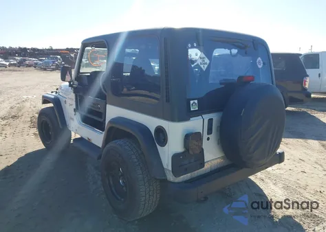 2002 Jeep Wrangler Sport z USA, uszkodzony, nr VIN 1J4FA49S72P750700